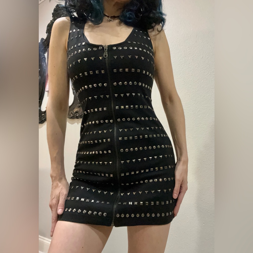 Bodycon dress with hardware detail.